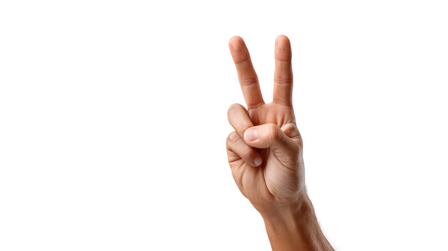 Hand gesture of peace and victory: A close-up shot of a human hand displaying the "V" sign, a universally recognized symbol of peace and victory.