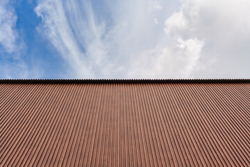Modern brown building with vertical coated wood pattern metal steel background