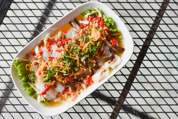 Close-up of fresh shrimp salad on the table.