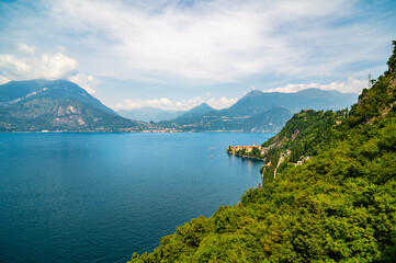 Panorama on Lake Como, with the villages of Tremezzina, Bellagio, Varenna and the mountains that overlook them, photographed in the evening.
