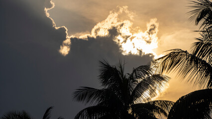Dark clouds blocking the sun creating a silver lining 2