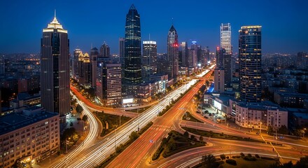 Night View of City Skyline with Illuminated Highways and Skyscrapers
