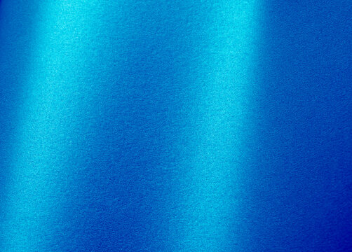 Texture with shiny blue metallic surface, vivid gradient, grainy noise effect, brushed glossy finish