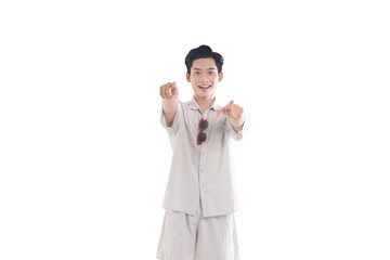 Asian guy wearing tourist clothes and sunglasses posing, travel concept