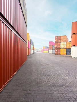 A perspective view of a container yard with stacked red, yellow, white and multicolored cargo containers. Industrial port scene representing global trade, shipping, and logistics.