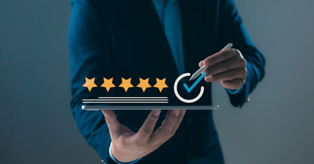Excellent customer reviews, high service ratings, quality assurance, successful performance in business, satisfaction, Person holding a tablet displaying five golden stars and a blue checkmark.