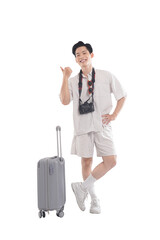Ready for Adventure: A joyful tourist, equipped with a camera, stands beside his suitcase, ready to embark on a new journey. The image radiates excitement and anticipation of upcoming travel.