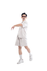 Asian guy wearing tourist clothes and sunglasses posing, travel concept