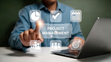 Person working on project management tasks on a laptop