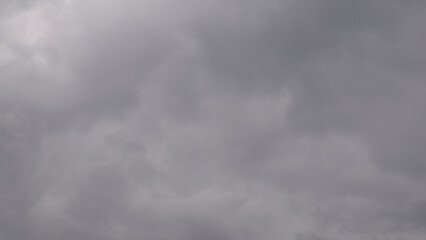 gray background, photo texture of gray sky and clouds