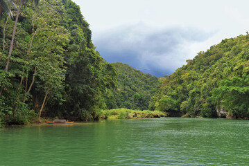 Lake among green hills. Mangrove forest in Philippine Bohol island