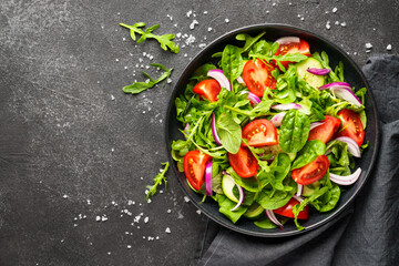Fresh salad with leaves and vegetables.