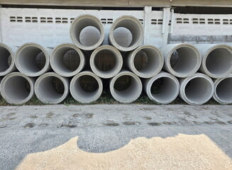 Concrete pipes with center hole stacked on the roadside is popularly used in plumbing, drainage and...