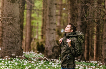 Man Enjoying Fresh Air and Nature in Forest