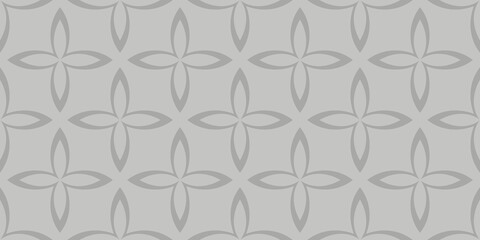 A seamless geometric pattern features interlocking floral shapes in shades of gray, creating a harmonious and symmetrical design. The repetitive motif is suitable for various decorative purposes.