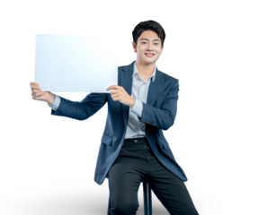young Asian professional presents a blank white sign with both hands, perfect for displaying a message, logo, or promotion.