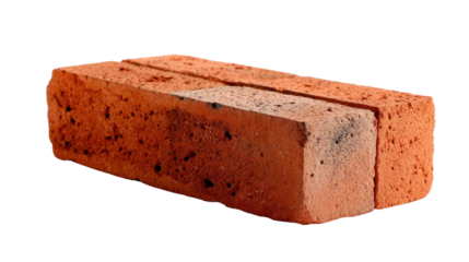 Brick Texture: A close-up view of a single, weathered red brick showcasing its textured surface and the timeless character of construction materials. 