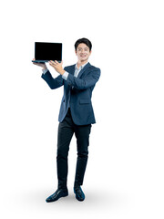 A confident young professional stands and presents a laptop with a blank screen, perfect for a website or software mockup.
