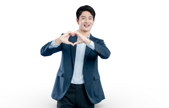 professional in a suit makes a heart gesture with his hands, perfect for concepts of charity, health, and customer care.
