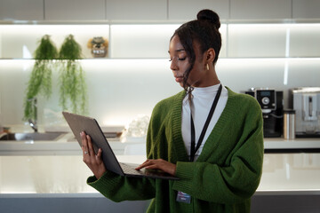 Diverse Office Portrait of Black Businesswoman in office and thinking while working on laptop, Business marketing, social media update or networking, black woman, African female worker