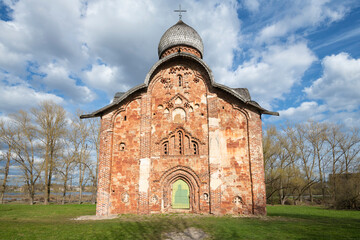 The medieval Church of Peter and Paul in Kozhevniki is close-up on a sunny May day. Veliky...