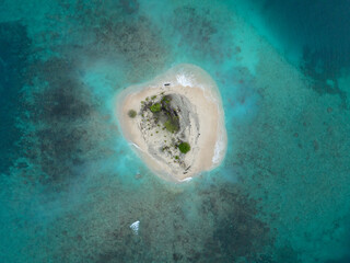 Aerial view of a beautiful small tropical island. Aerial view of a small island with turquoise water