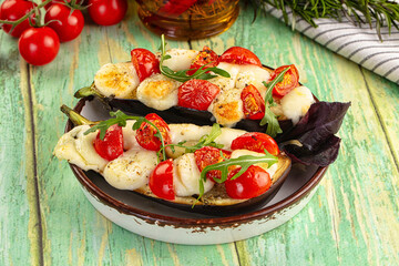 Baked eggplant with cherry and mozzarella