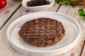 Grilled juicy beef cutlet for burger