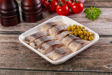 Slided marinated salted herring fillet
