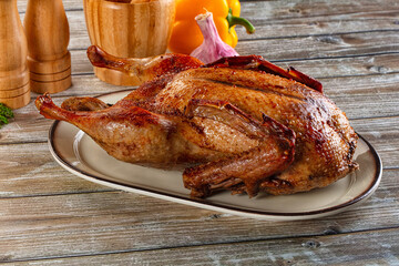 Baked with spices whole duck