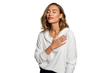 Portrait of a serene woman with eyes closed and hand on chest, expressing peace and gratitude. Dressed in white, isolated on transparent background