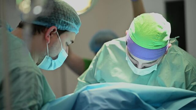 Surgeons Carrying Out Surgical Procedures in the Operating Room with Precision and Care
