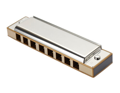 Metallic harmonica mouth instrument, isolated on white.