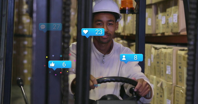 Operating forklift in warehouse, man with image of social media icons - Powered by Adobe