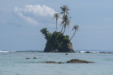 Aerial view of a beautiful small tropical island. Aerial view of a small island with turquoise water