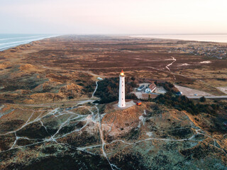 A lighthouse at sunset