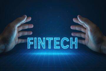 A digital model illuminated by two hands symbolizes innovation and collaboration within the fintech sector's evolving landscape