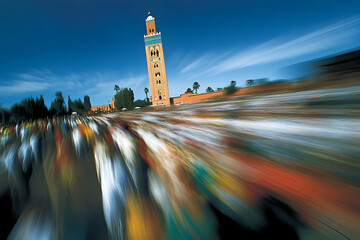 Motion Blur of Crowd Before Moroccan Minaret