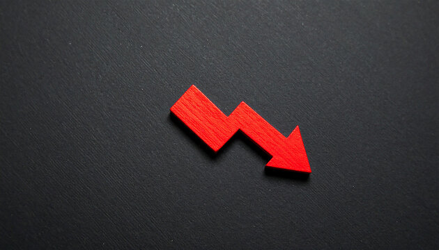 Red wooden arrow pointing down on black background. Business, market decline or economic concept.