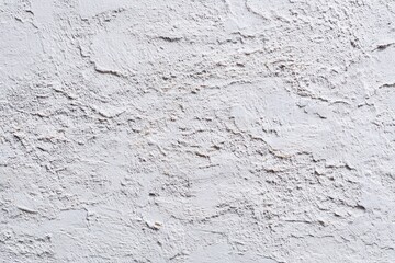 Textured white concrete surface ideal for modern interior designs and minimalistic decor projects