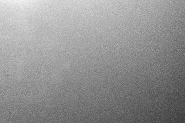 ステンレス素材の金属表面をクローズアップ撮影したテクスチャ背景。シルバーの無地パターンで、金属特有の質感や微細な模様が特徴。工業デザイン、建築、インテリア、製品パッケージ、広告、プレゼンテーションなど多用途に利用可能な高解像度素材。

