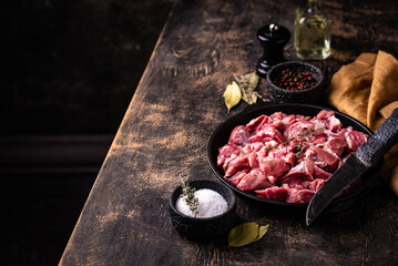 Raw chopped meat with spices