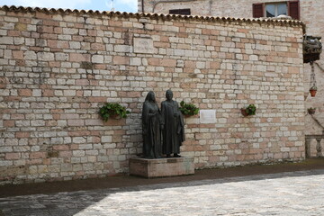 Bronze monument dedicated to the parents of St. Francis, in Assisi, Italy.