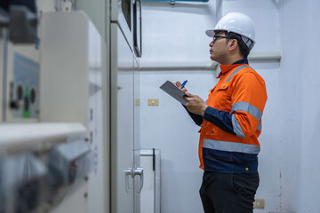 Electrical engineers and technicians work together to solve electrical system failures in...