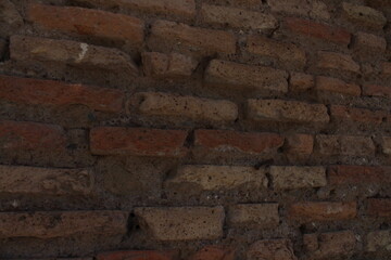 Ancient red bricks textured background wallpaper. Red bricks wall in Rome