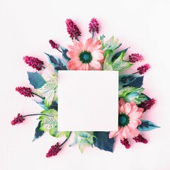 A bouquet of light salad and pink flowers on a white background with space for text.