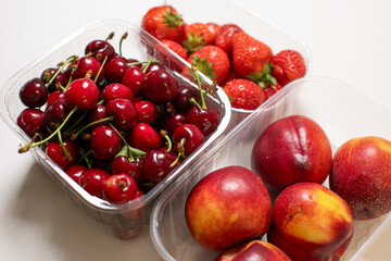 A medley of vibrant cherries, strawberries, and nectarines, perfect for a Midsummer feast or National Fruit Day indulgence