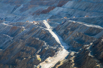 Rugged serpentine paths curve through an ethereal lunar landscape, echoing Earth's hidden...