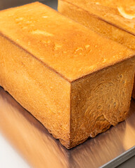 Golden, fluffy Shokupan loaf entices with a buttery crust, perfect for Hinamatsuri feasts or whimsical toast art creations