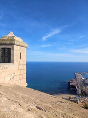 Coastal cityscape of Benidorm, Spain, featuring sandy beaches, clear blue water, and modern skyline. Popular Mediterranean destination known for tourism, sun, and vibrant seaside views.